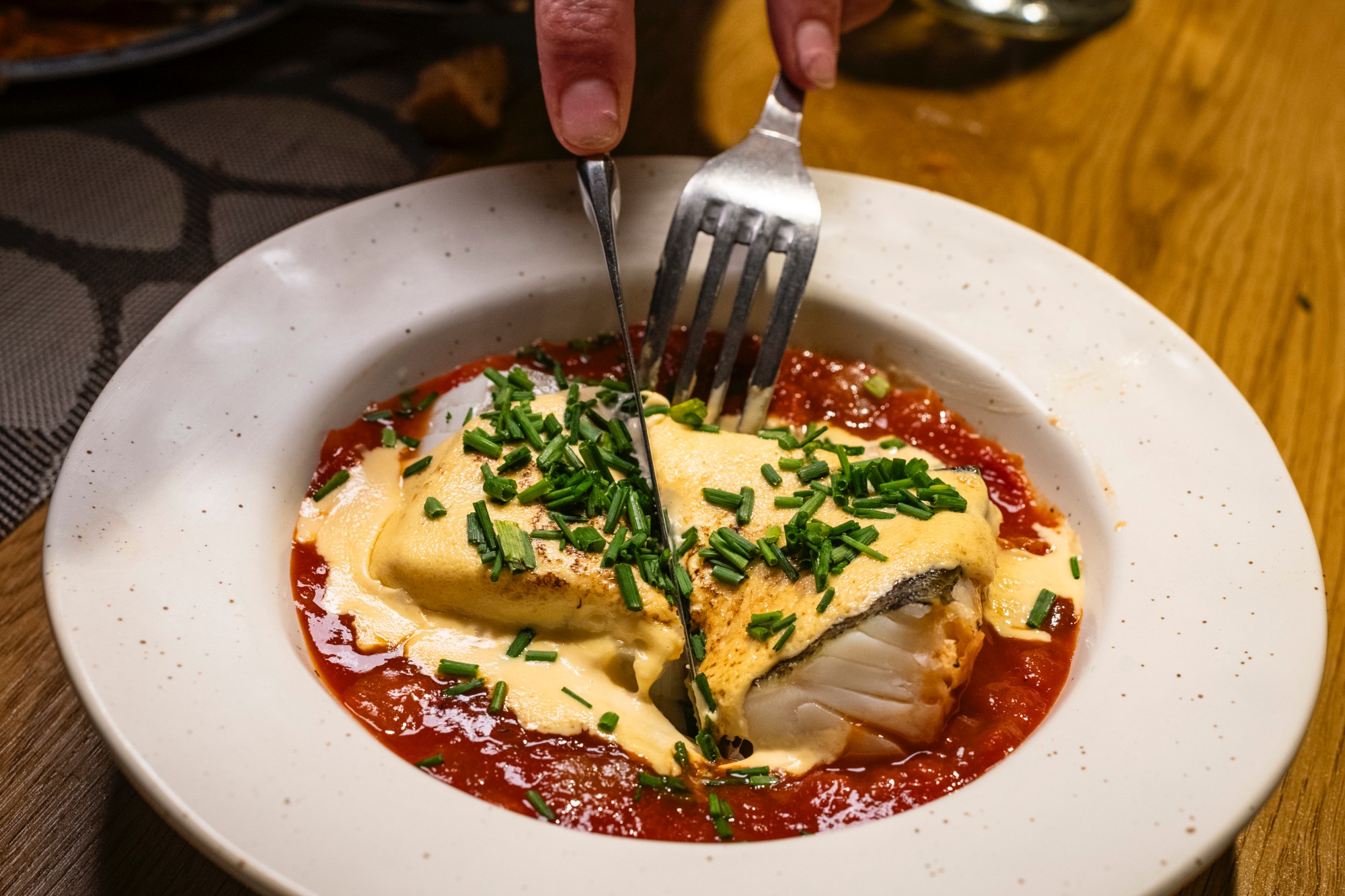 Bacalao con asadillo de pimiento al estilo manchego