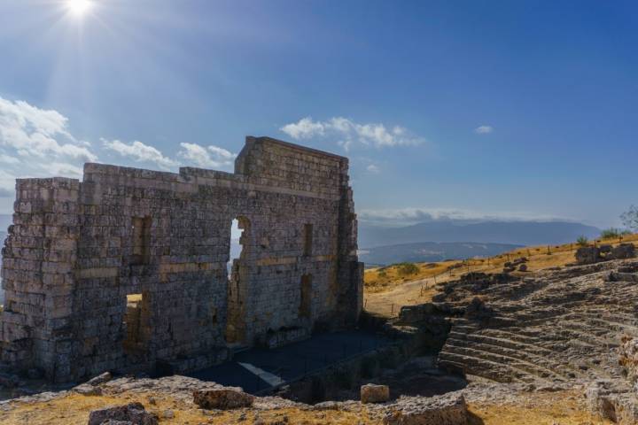 rear view of the Roman theater of Acinipo in Ronda, Malaga with the amphitheater in the foreground.